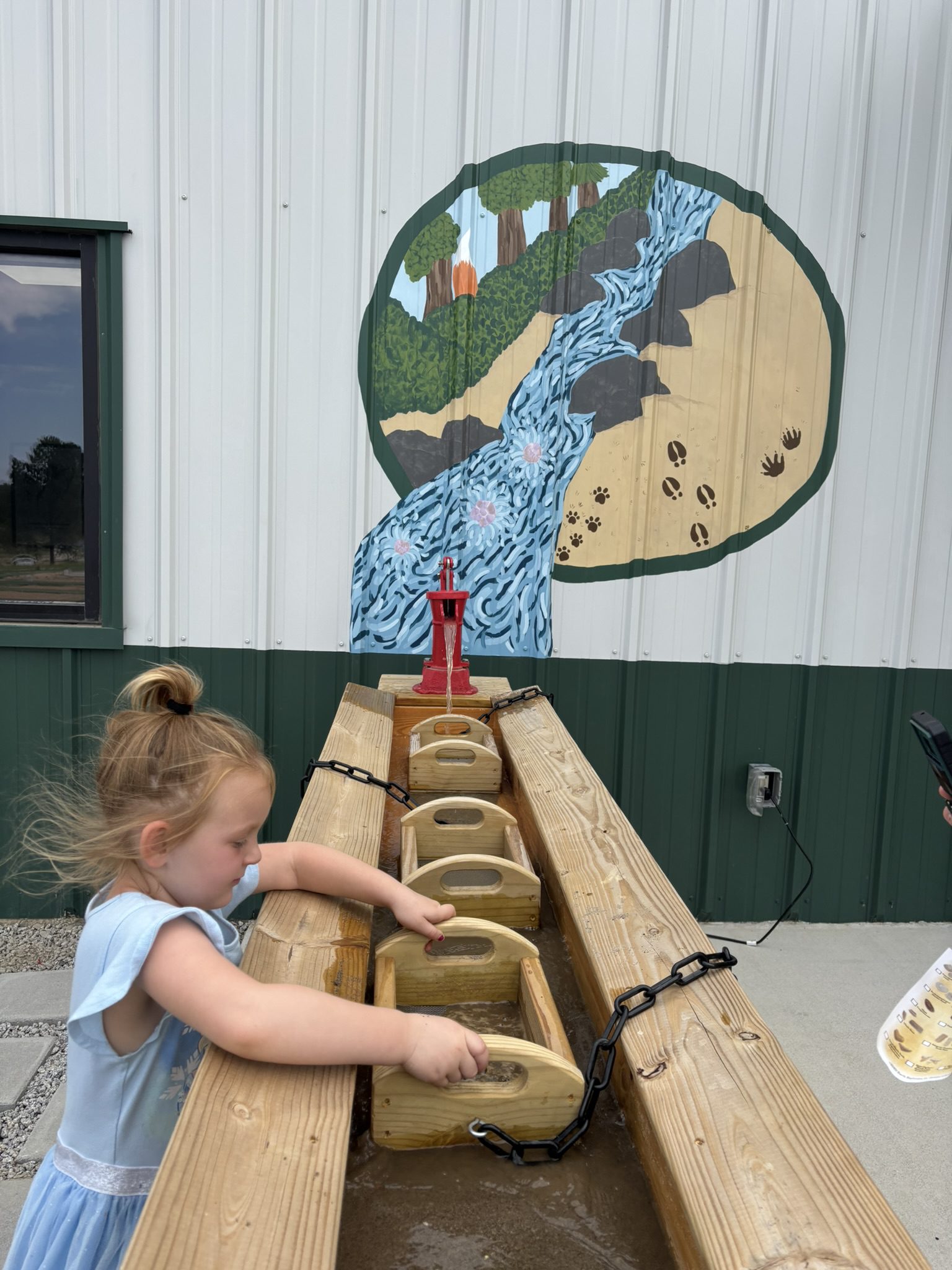 Little girl mines for gems at Standing Pines campground near Hartsville, SC